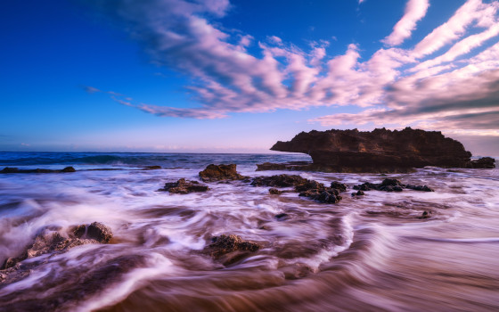 Ocean's Embrace: Nature Painting of a Coastal Rock at Dawn with a Warm and Cold Palette in Acrylic Print