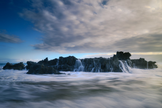 Seascape Symphony: An Acrylic Print Celebrating the Mystical Meeting of Dawn, Ocean Waves, and Rocks