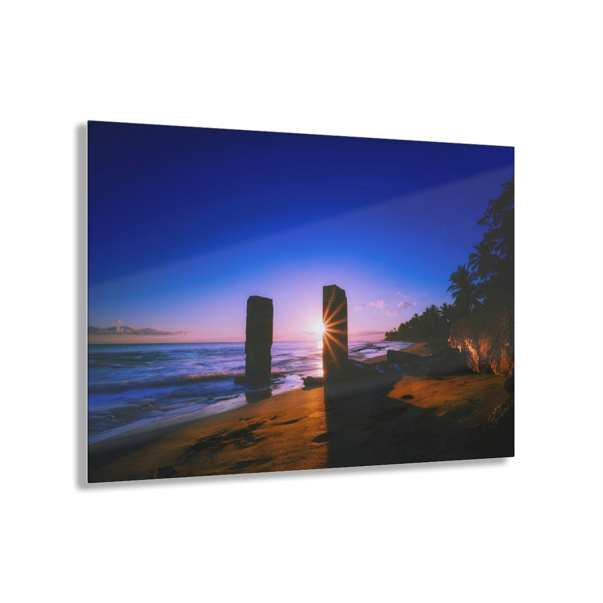 Rising into the Mystical: Tropical Beach Sunrise Illuminates the Ocean Surface and the Mysterious Pillars That Rise from Below, in this Acrylic Print